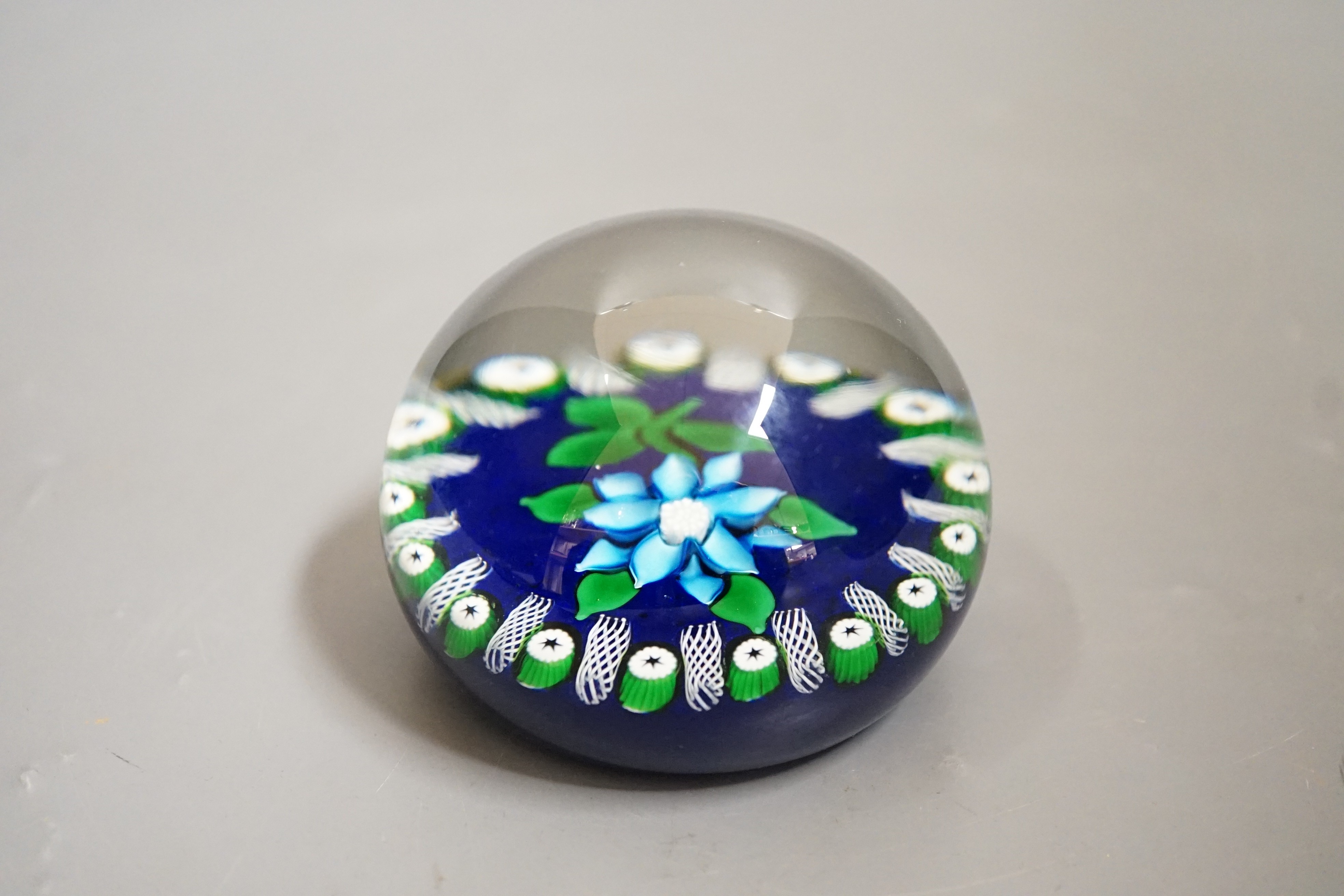 A John Deacon blue clematis paperweight, JHD 1998 cane rod